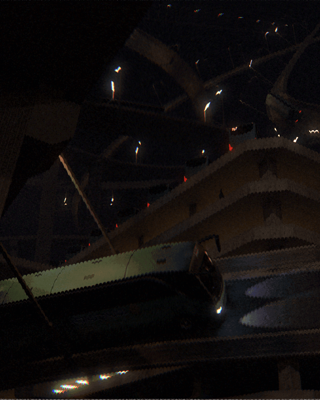 Futuristic green train moving through a complex, multi-level transportation hub at night.