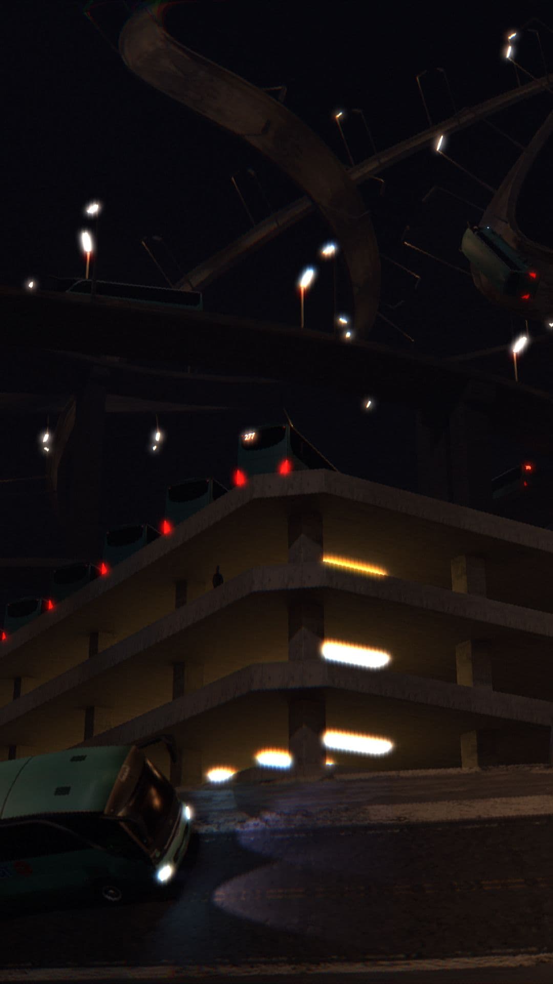 A multi-level parking garage at night, illuminated by yellow and white lights.