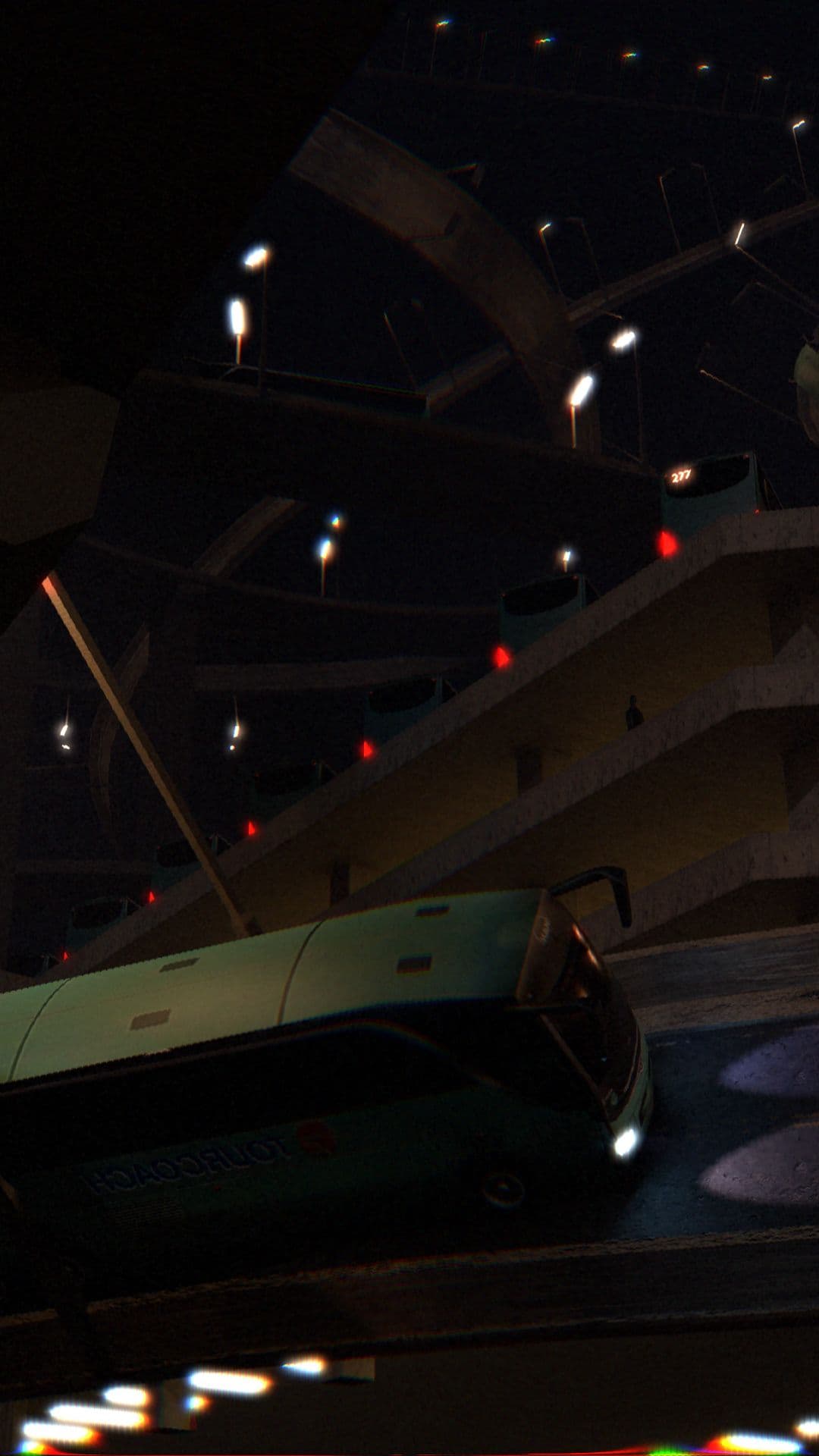 A blurry image shows a helicopter in a dark, possibly indoor, setting with lights in the background.